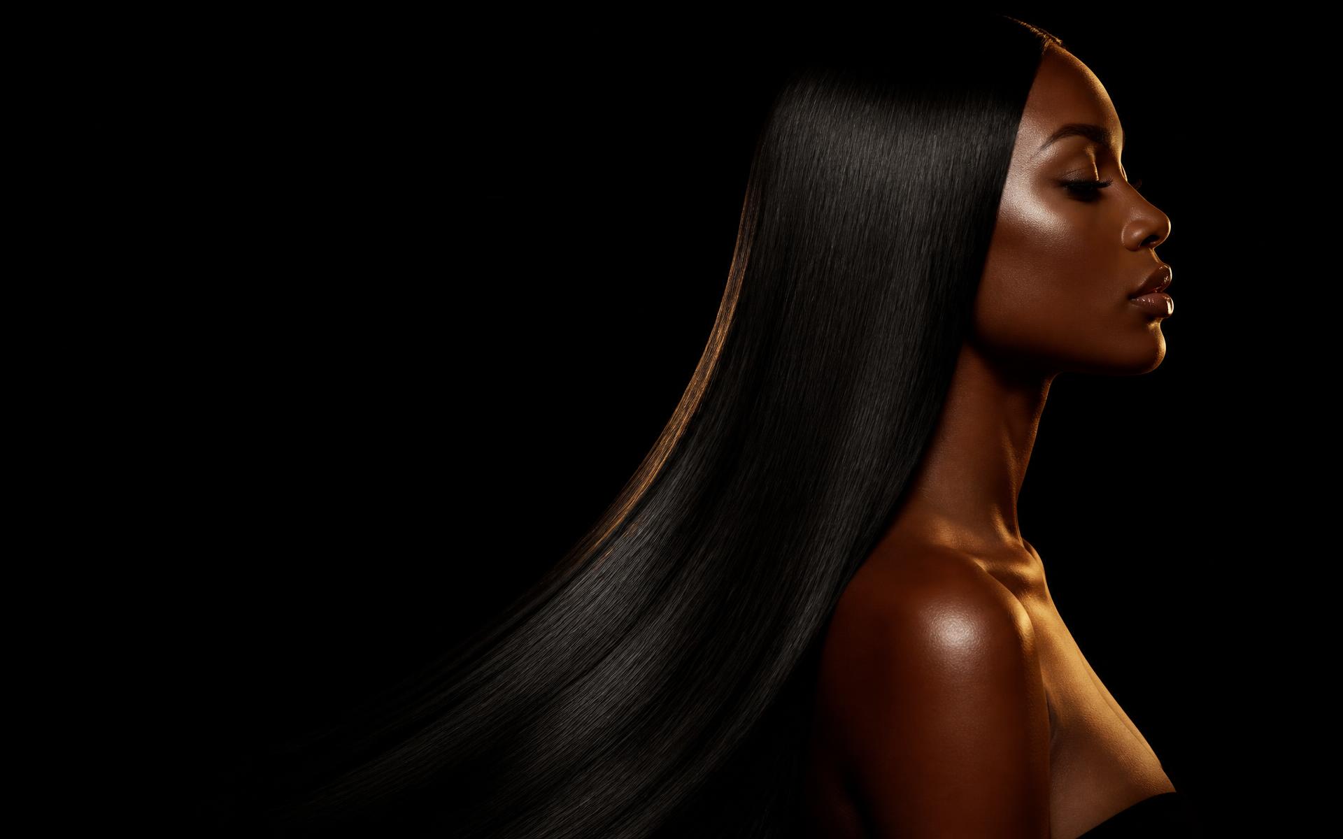 Model with long, glossy natural black straight hair